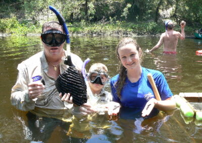 Ken R. and family show everyone how it's done! Large mammoth tooth found snorkeling.